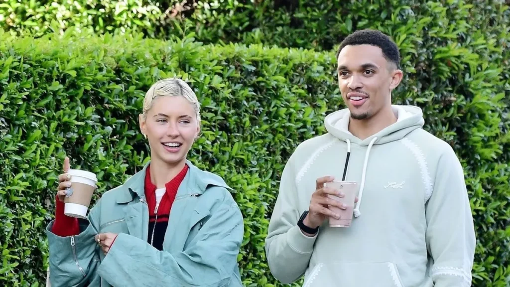 Trent Arnold alongside his girlfriend Iris Law