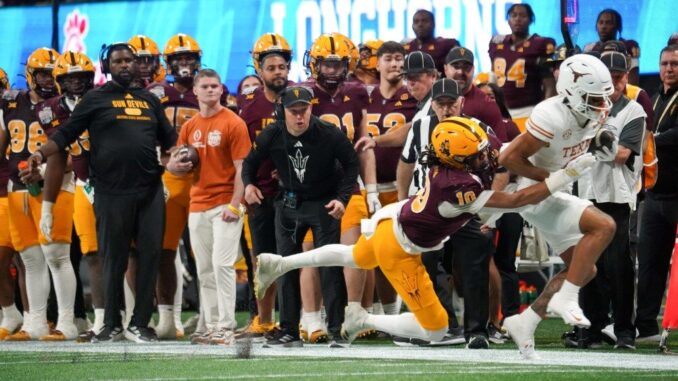 Arizona-State-head-coach-Kenny-Dillingham-watches-play-e1736626722129